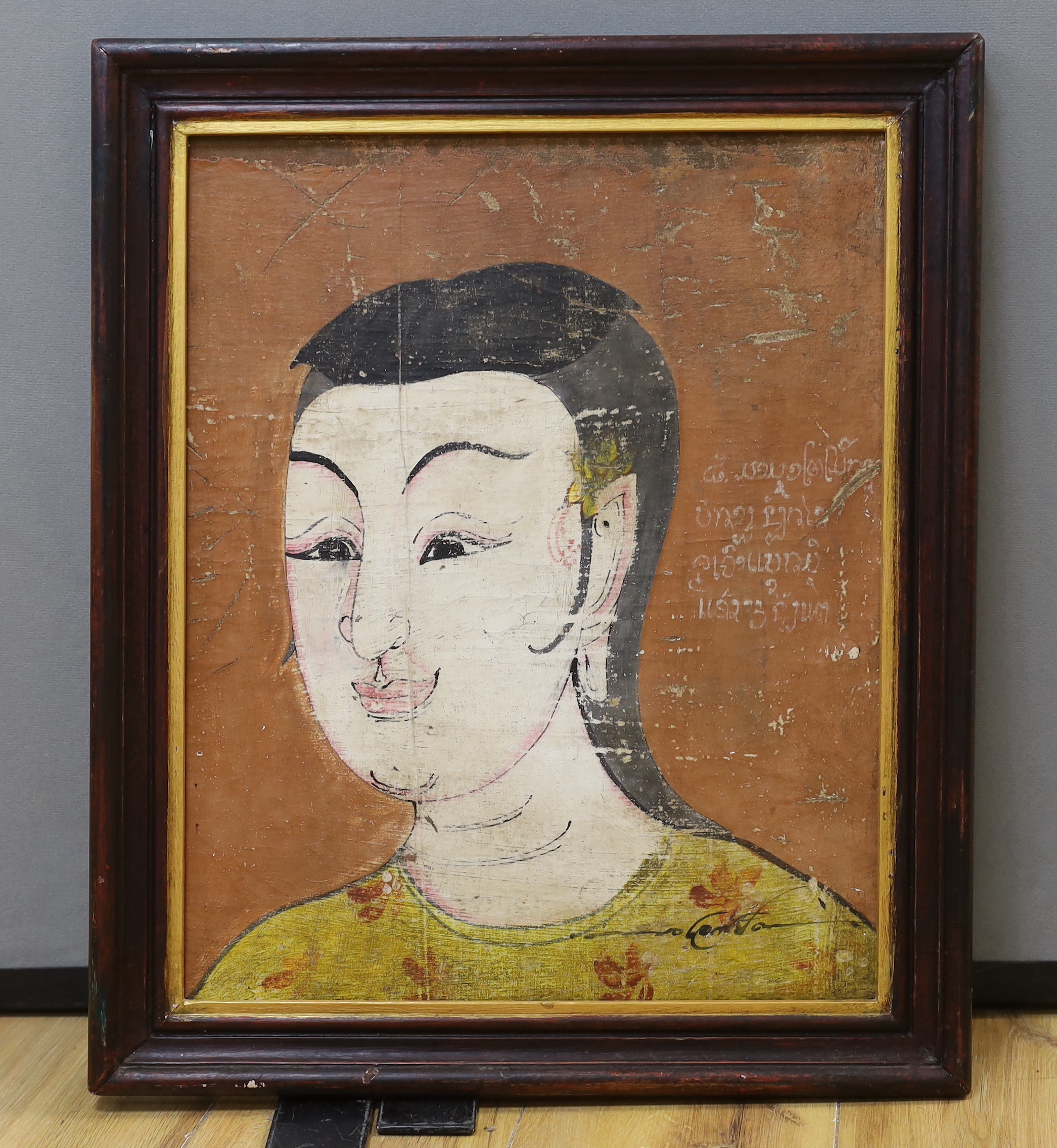 Thai mixed media on board, Head and shoulders portrait of a lady, indistinctly signed, 45cm x 36cm